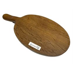 Mouseman - oak cheeseboard, oval from with projecting handle carved with mouse signature, by the workshop of Robert Thompson