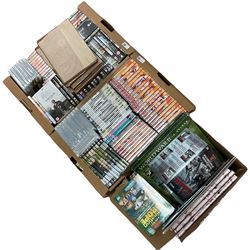 A large collection of John Wayne DVDs an