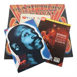 Music memorabilia, including cardboard globe, a free gift with the Wings Over America vinyl, music programmes, including Concert for George, Paul McCartney World Tour, Wings programmes, Glastonbury 1986, 10CC programmes, Knebworth Fair 1976 programme, etc