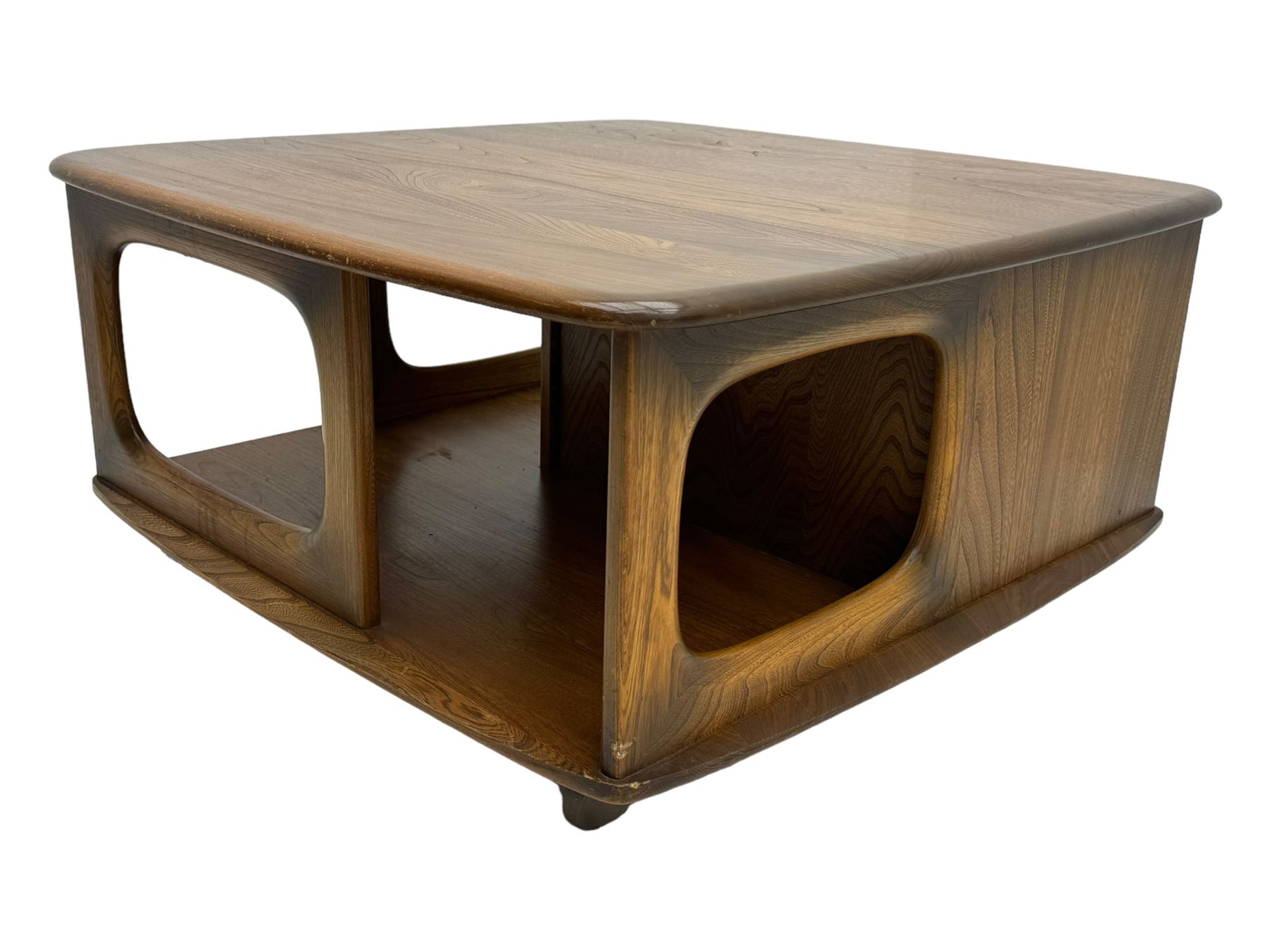 Lucian Ercolani for Ercol - elm 'Pandora's Box' coffee table, square top with rounded corners over two drawers with sculpted recessed pulls, open sides supporting undertier, on castors 