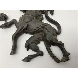 Pair of Victorian cast iron fire dogs, modelled as a lion and unicorn, H27cm