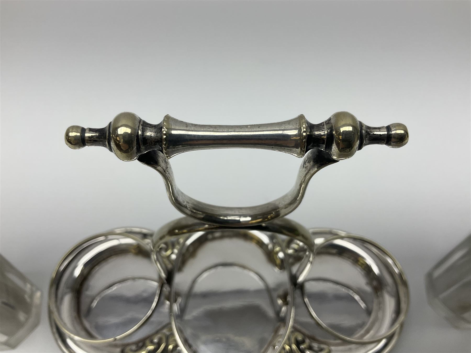 Sheffield silver-plated cruet set, comprising mustard pot, open glass salt and pepper pot on stand, together with a collection of silver plated spoons