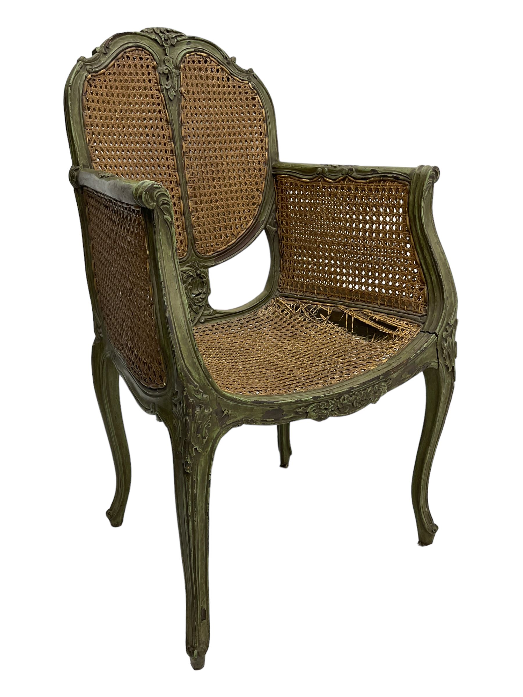 19th century French Louis XV-design armchair, carved and painted wood frame, caned back and seat with scrolled arms, supported by cabriole supports with acanthus leaf decoration