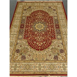  Keshan red ground carpet, central medallion, floral field, repeating border, 300cm x 200cm  