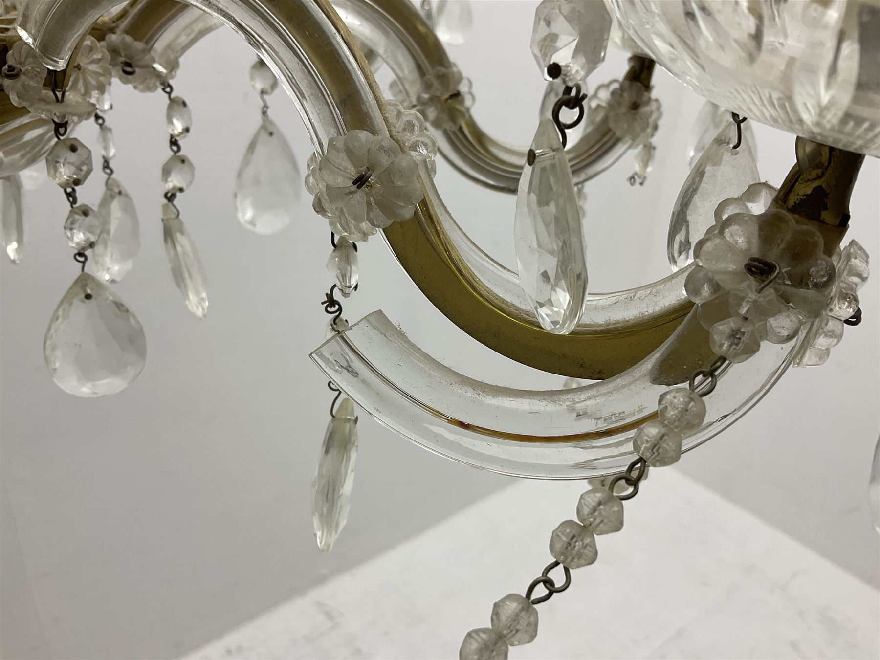 Victorian style glass eight branch chandelier, with drip trays, brass tone support, and drops