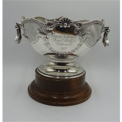  Silver rose bowl trophy embossed horses head and swag decoration, swing handles by Fattorini & Sons Ltd, Sheffield 1964, inscribed 'Grand National Trial Stakes Catterick 1965', approx 31oz   