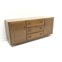 Ercol light elm sideboard, three drawers flanked by two cupboards, E156cm, H69cm, D47cm