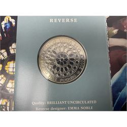 Seven Queen Elizabeth II United Kingdom five pound coins, including 2006 and 2007 in card folders, etc. 