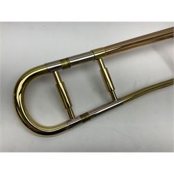 Sebastian Bucklet Aquae Sulis copper and brass trombone No.0910004; in lightweight carrying case; and Kinsman folding tubular chrome music stand in case (2)