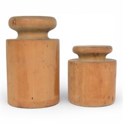 Two 19th century turned wooden pork pie moulds, largest H19cm