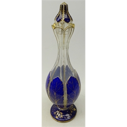  Large 19th century Bohemian blue & white overlay glass footed decanter, the sectioned body gilded with stiff leaves and scroll foot, H47cm     