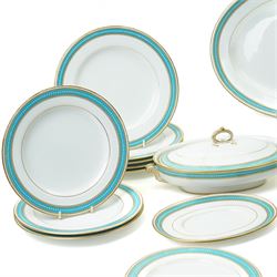 Spode Copeland's china part dinner service, circa 1900, with a blue and gilt jewelled border comprising ten dinner plates, seven dessert plates, two side plates, pair of vegetable dishes and covers, two sauce tureen stands and oval meat plate retailed by T Goode, London