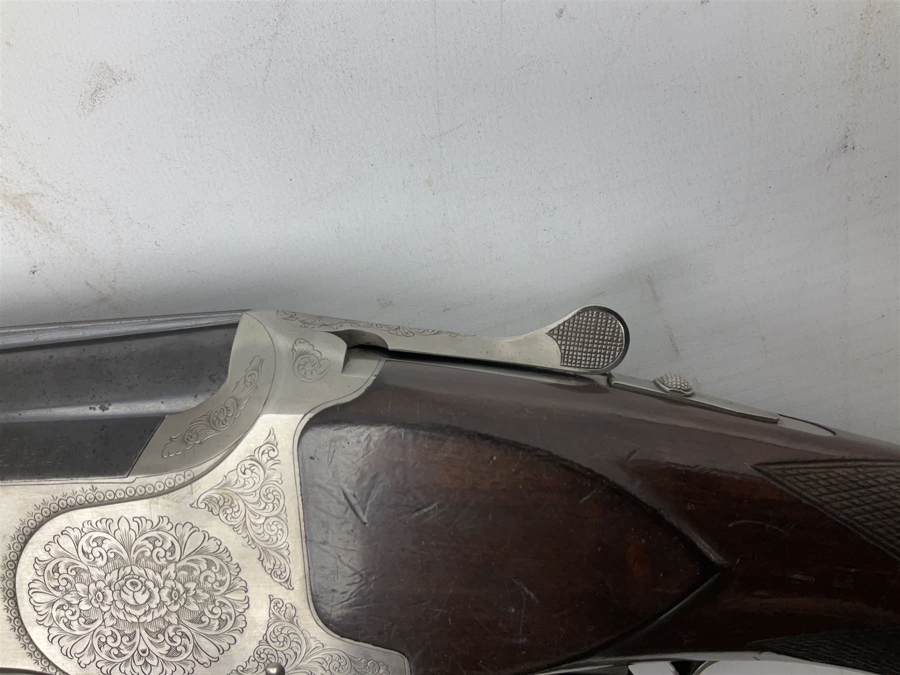 Winchester Japan 5500 12-bore by two-and-three quarters over-and-under double barrel boxlock ejector sporting gun, with 71cm barrels, ventilated rib and barrels, the walnut stock with chequered pistol grip and fore-end, single selective trigger and top safety, serial no.K542927E, L115cm overall; in gun sling SHOTGUN CERTIFICATE REQUIRED