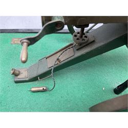 Scratch built brass model of an 1861 Gatling Gun with rotating barrels, hinged cover revealing mechanism, on metal bound wooden spoked wheels and rectangular base L47cm H22cm