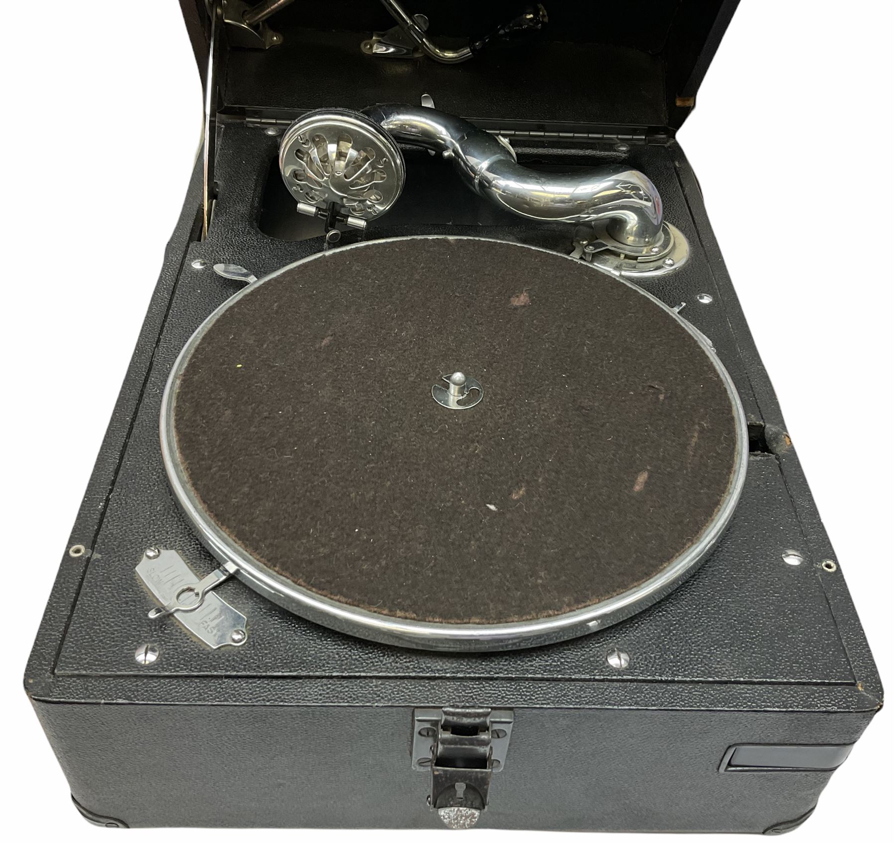 HMV portable wind up gramophone in a black case, together with a collection of records. 