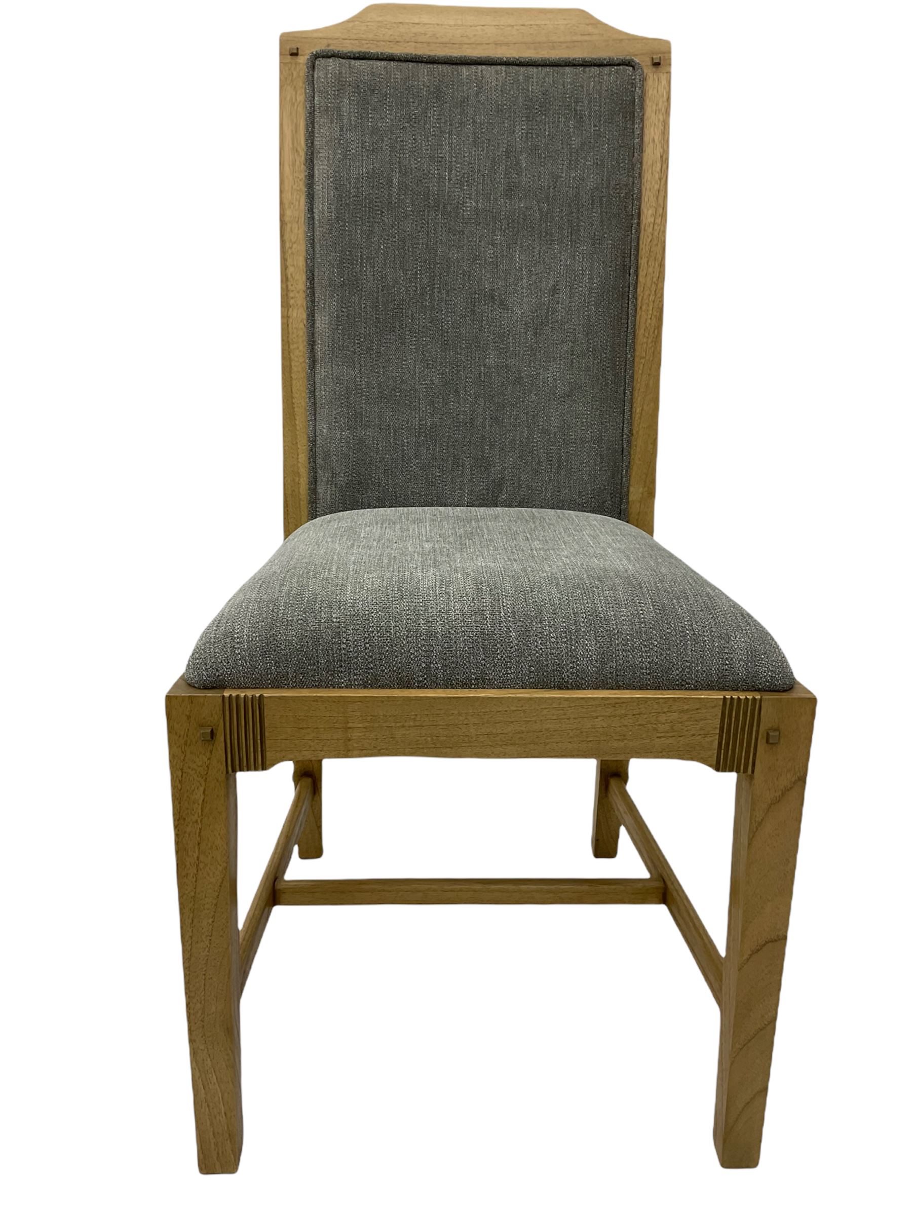 Windsor by Mark Devany oak rectangular extending dining table, with butterfly leaf, and four chairs with upholstered seats and backs