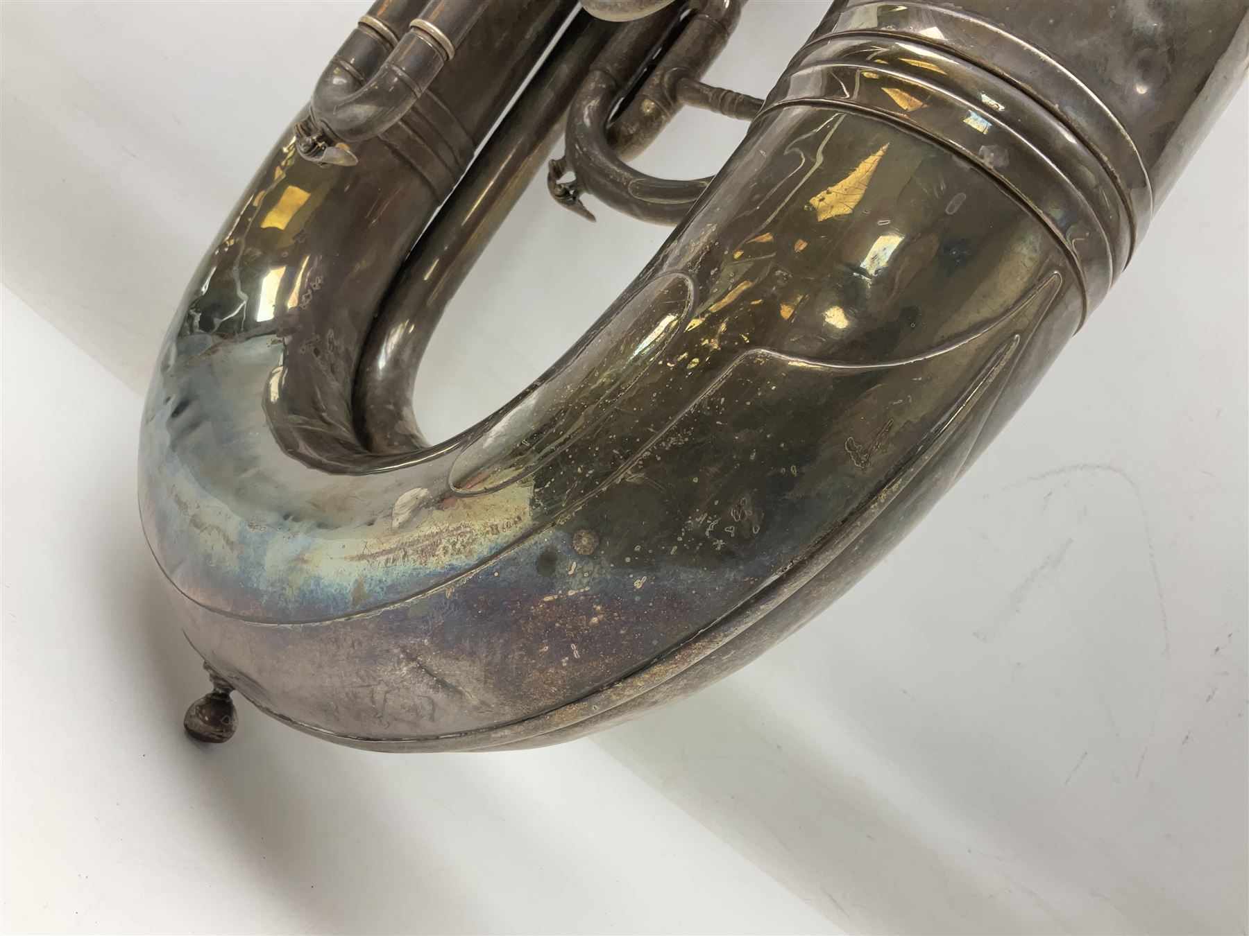 Boosey & Co silver plated 'Solbron' Class A Tuba c1920, serial number 102760, with compensating pistons and foliate engraved decoration H106cm 