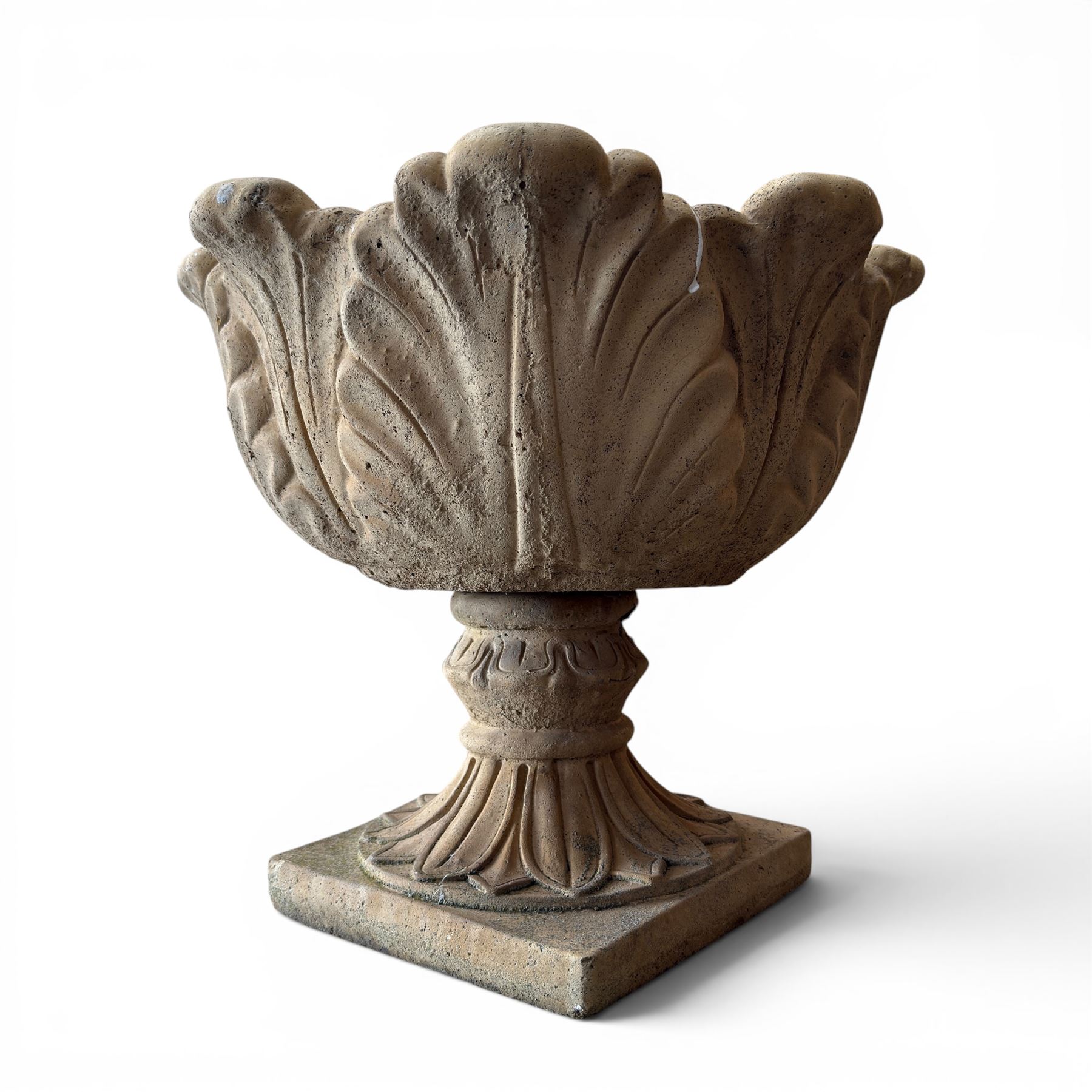 Cast stone five sectional urn on plinth, squat leaf and petal design urn on square base