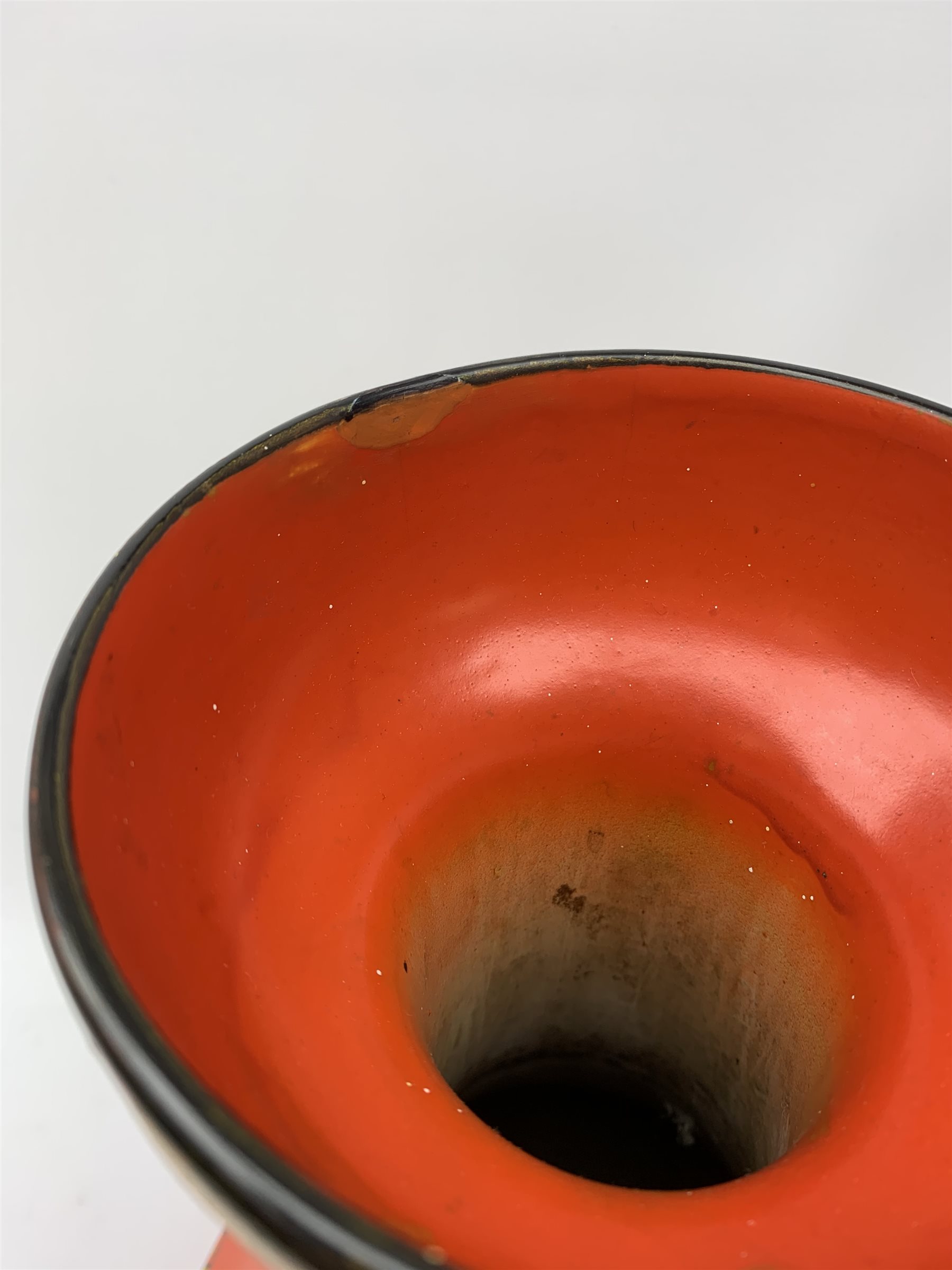 A large Shelley vase, of bulbous form with waisted neck and flared rim, the red ground decorated with the Vine and Grape pattern, with printed mark beneath and painted pattern no 8632, H41cm. 