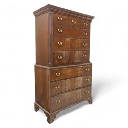 Mid 18th century oak tallboy chest, the projecting cavetto-moulded cornice over two short ...