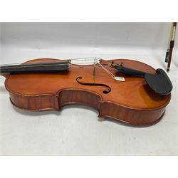 German 1977 C A Gotz Jr full size viola, back neck and sides in maple with a spruce top, ebony fittings and fingerboard with two bows in a hard case Length 69cm