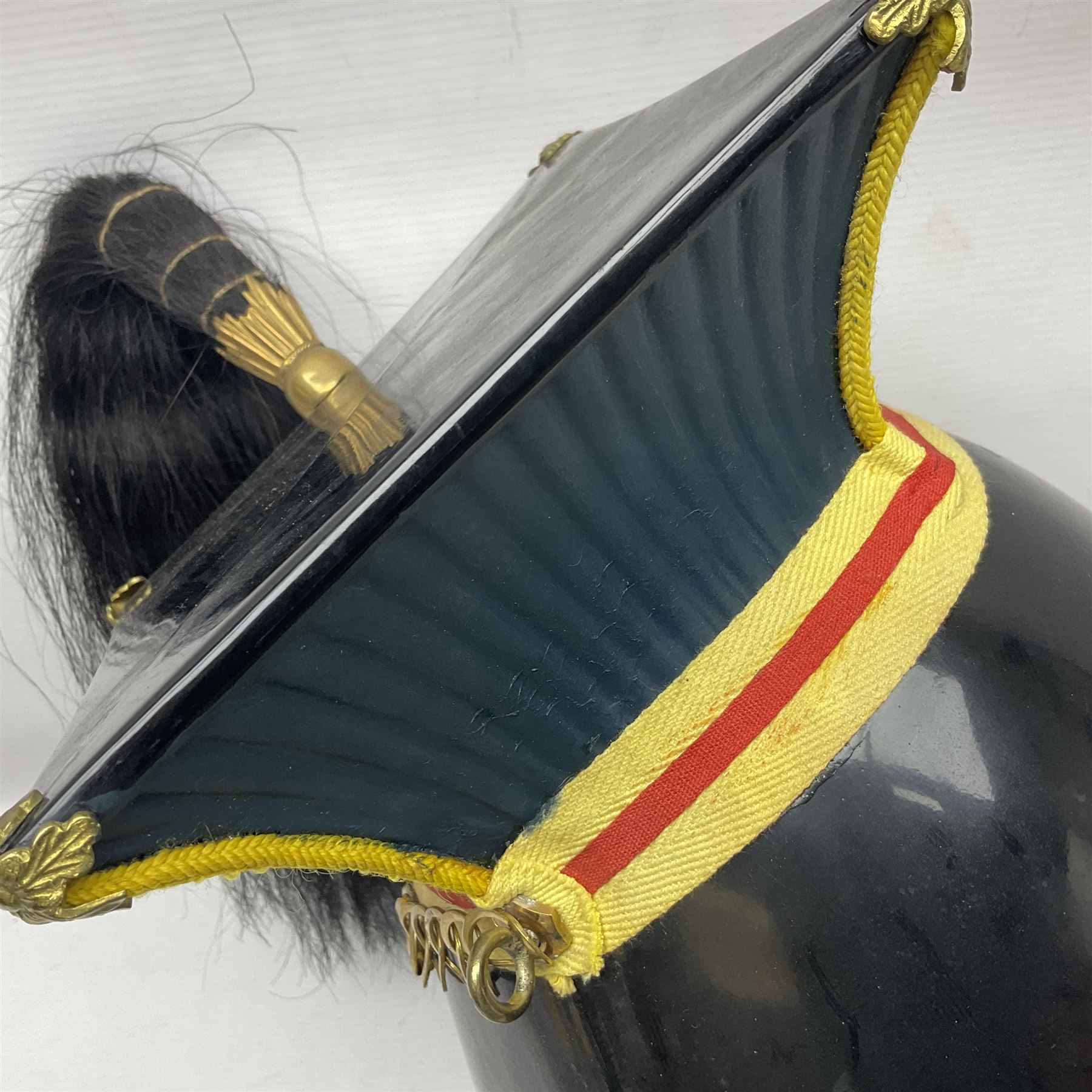 Lancers cap with original 19th century fittings for the 16th Lancers on a modern fibre glass shell with liner