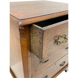 Small Georgian style figured walnut chest, rectangular moulded and crossbanded top over three drawers, the figured drawer fronts with crossband, shaped and engraved brass handle plates, canted uprights, on bracket feet