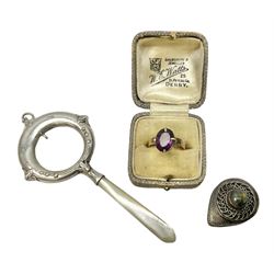 Silver baby's rattle/teether with mother of pearl handle, by Henry Clifford Davis hallmarked Birmingham 1924, together with a gold stone ring, the shank testing 9ct, the head base metal, resized with copper, weight 2.5g, and a small silver teardrop shaped box stamped 925 with cabachon, rattle L10cm