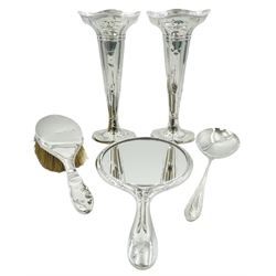 Group of assorted silver, comprising Beauchief pattern serving spoon, hallmarked Sheffield 1943, makers mark ES, pair of specimen vases, of tapering form with shaped and pierced rims, hallmarks worn and indistinct, and silver mounted handheld mirror and hair brush, hallmarks worn and indistinct, approximate gross weighable silver 10.60 ozt (330 grams)