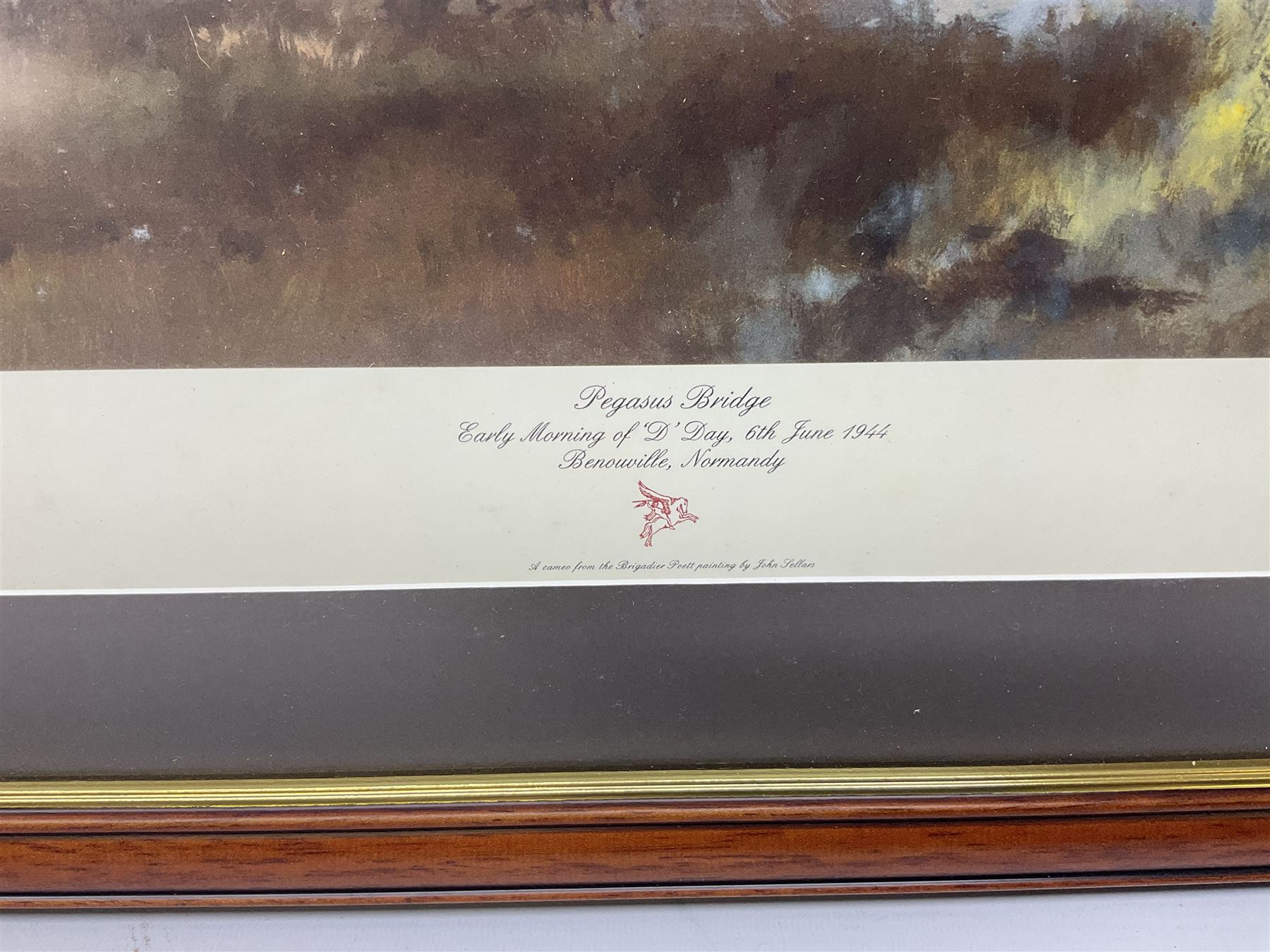 After Alan Fernley, colour print 'The Bridge at Arnhem', signed on the mount, 37 x 50cm; and after John Sellars, colour print 'Pegasus Bridge. Early Morning of D-Day 6th June 1944 Benouville Normandy'; both in mahogany stained frames (2)