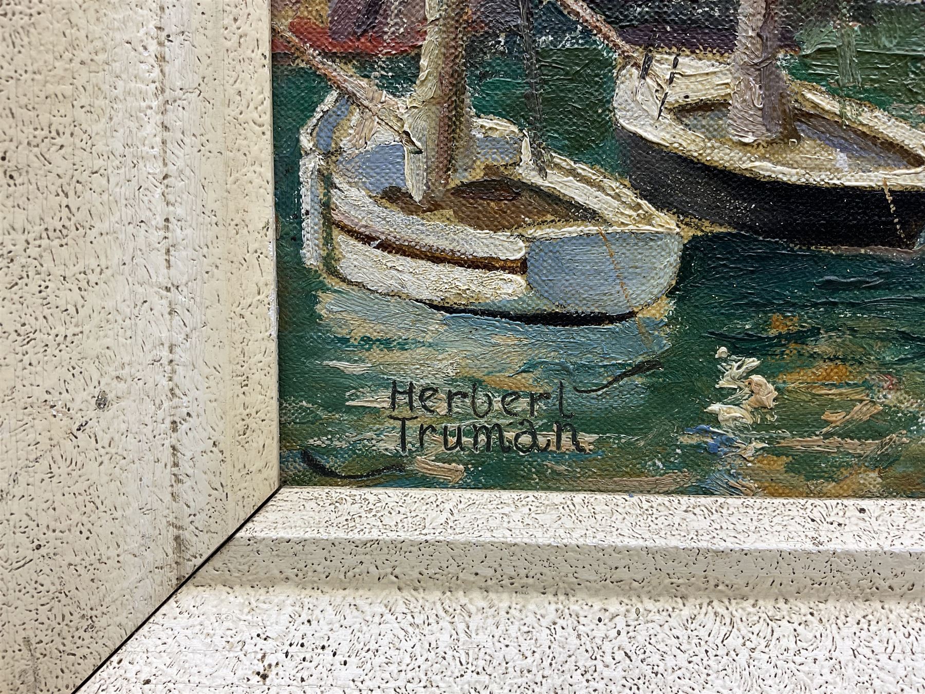 Herbert Truman (St. Ives 1883-1957): ‘Corner of Newquay Harbour’, oil on board signed, titled on label verso 31cm x 45cm