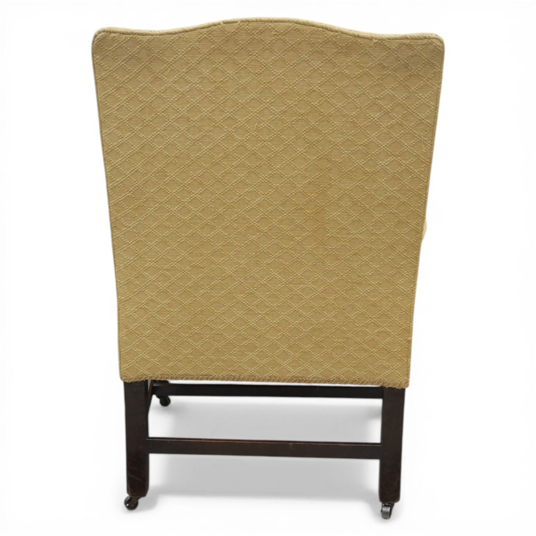 20th century Gainsborough style open armchair, upholstered in patterned fabric, the chair with shaped padded back and scroll arms on moulded frame