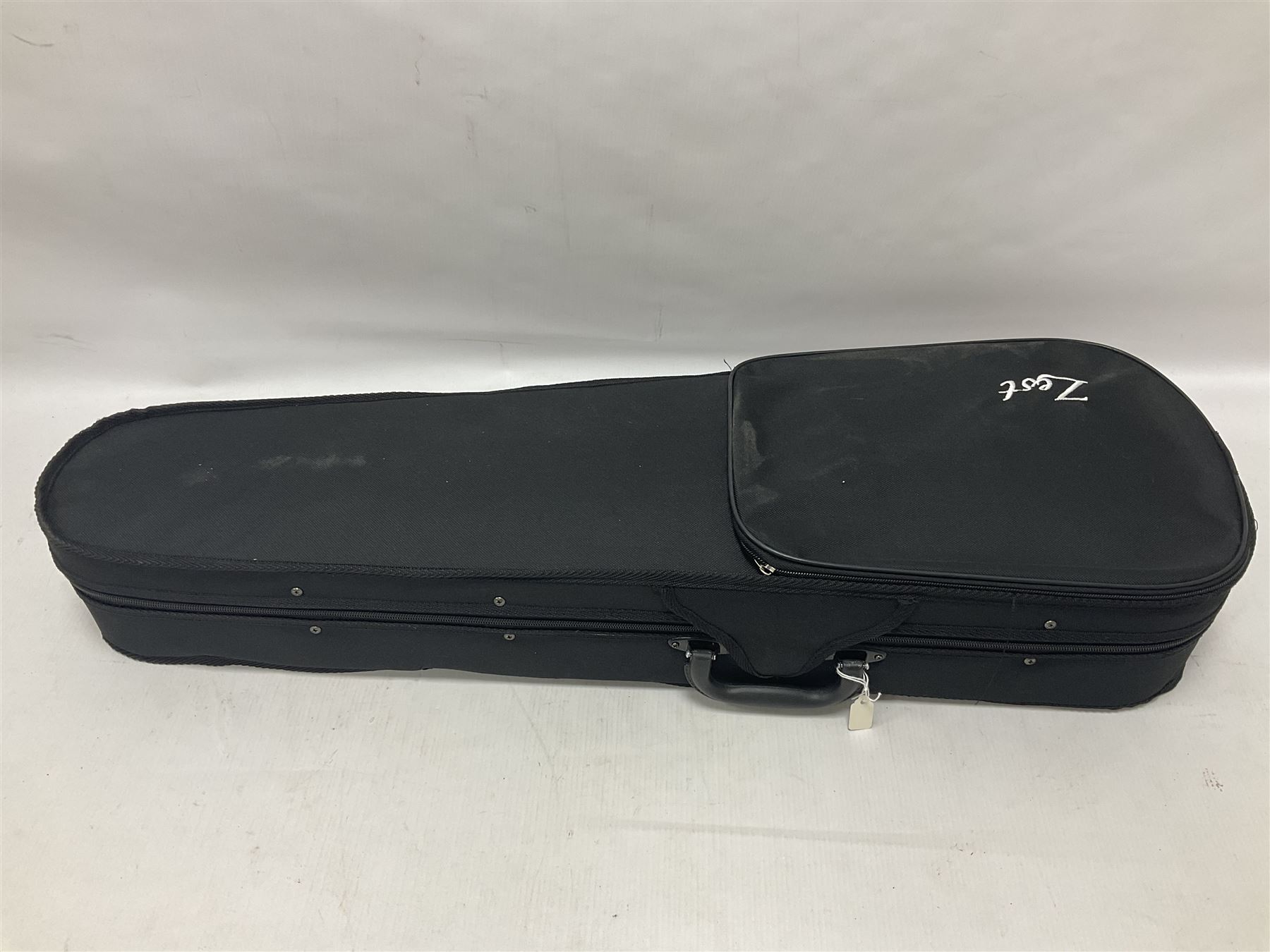 Zest full size pink violin, with a solid wood body and maple head, with matching pink bow and two further bows, in a hard case Length 60cm