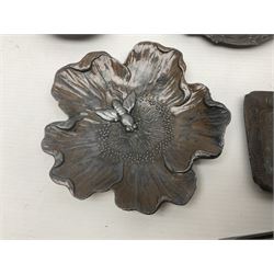 Brass sunfish ashtray, Chinese silver plated trinket box with mirror, bronzed matchbox cover and a collection of other Oriental bronzed embossed metal trays