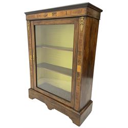 Victorian walnut pier cabinet, moulded rectangular top over inlaid frieze and uprights, enclosing by single glazed door, the interior fitted with two shelves, on shaped bracketed plinth base