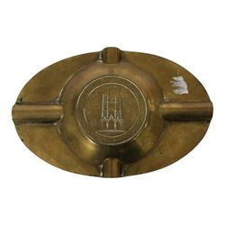 Collection of trench art, including a vase with scalloped rim, applied with a helmet plate to the 45th regiment, mounted on a canted rectangular walnut plinth, together with ashtray with matchbox holder to the center, pair of Boer war vases etc 