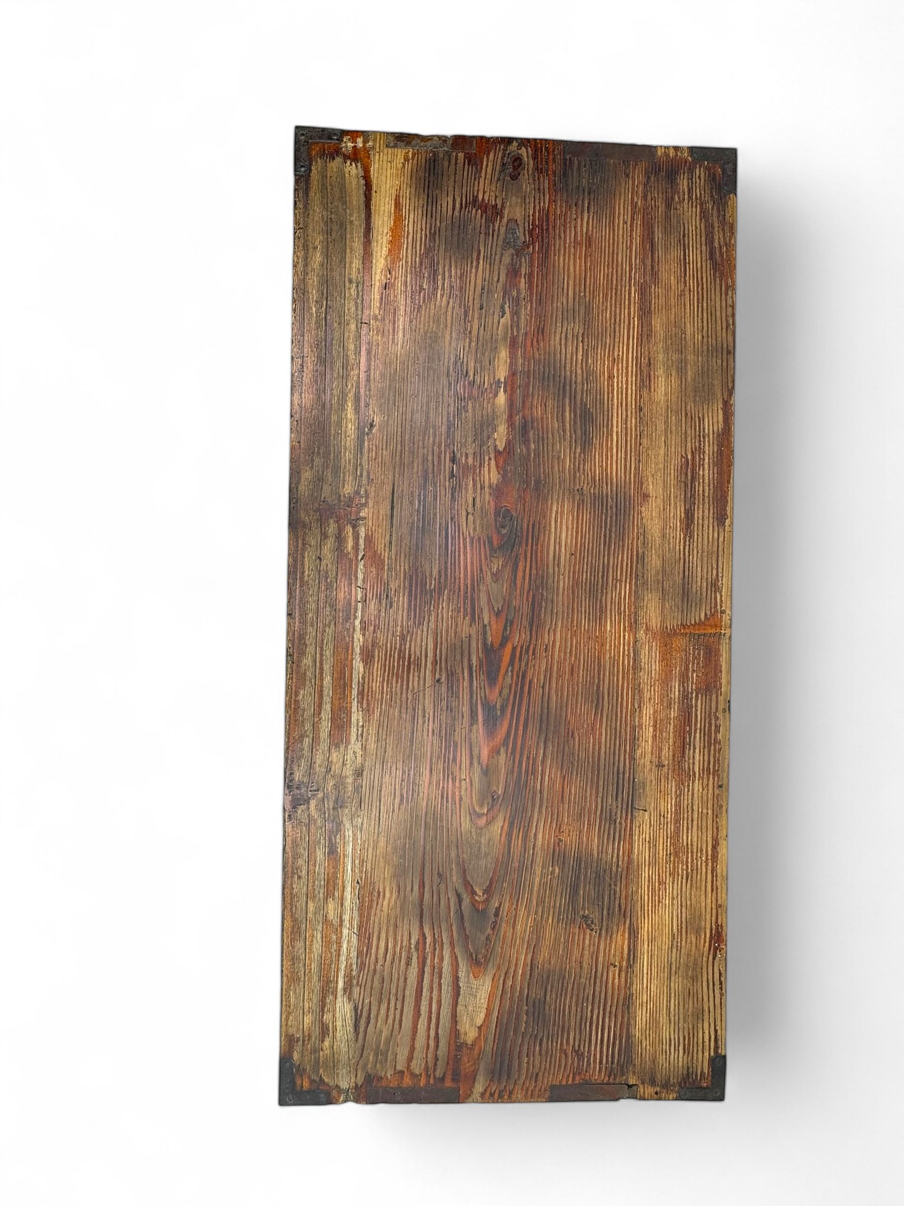 Late 19th century Japanese tansu chest, crafted with a cedar frame and cypress wood panels, original iron fittings throughout, comprising a single long drawer above smaller drawer and hinged cupboard door enclosing two smaller internal drawers and storage compartment, mounted on a bespoke black metal stand