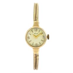 Russell ladies 9ct gold manual wind wristwatch, on 9ct gold snake link bracelet, hallmarked