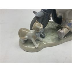 Lladro figure, In No Hurry, modelled as a girl on a tricycle, sculpted by Francisco Polope, with original box, no 5679, year issued 1990, year retired 1994, H15cm