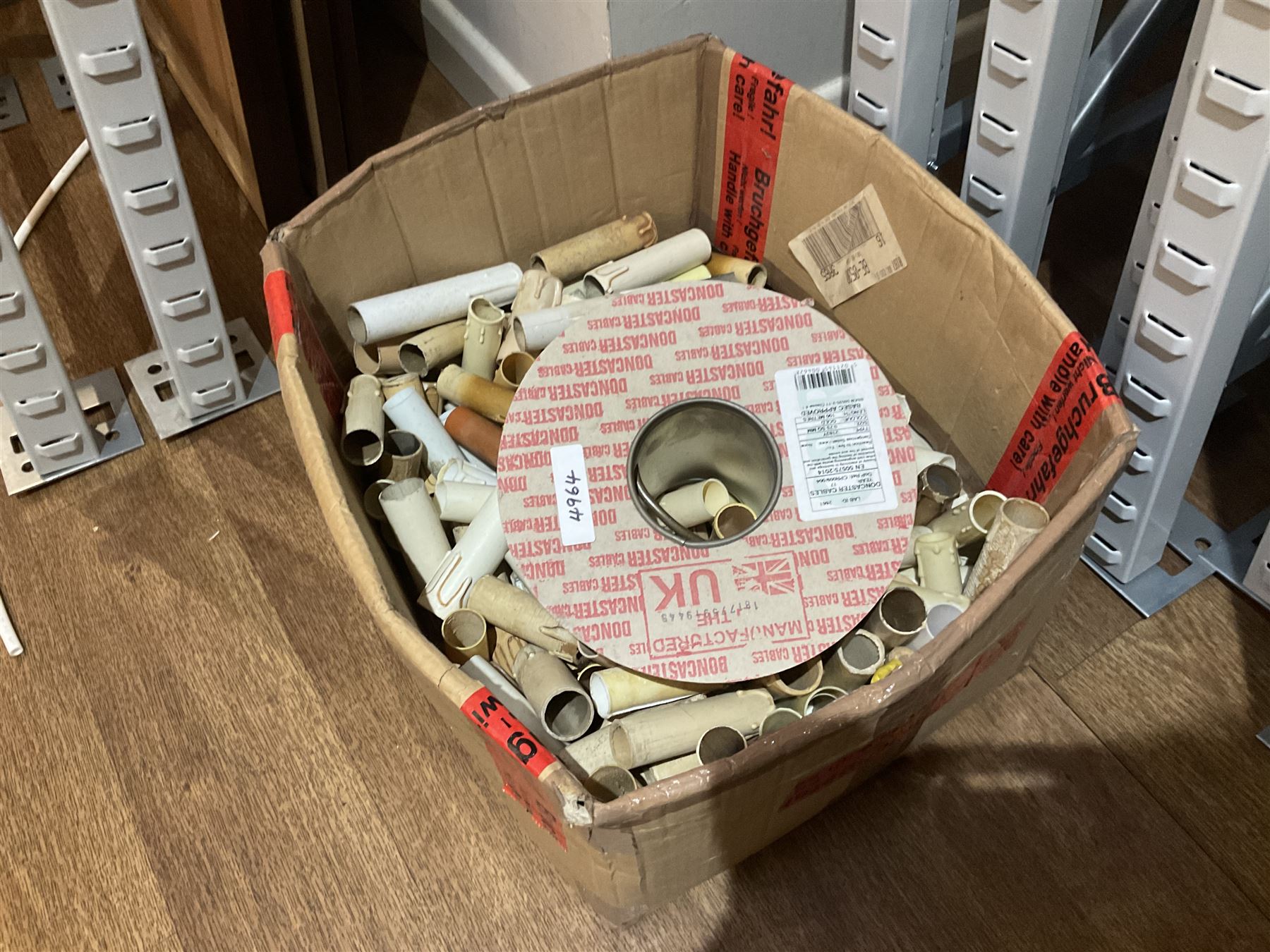 Large quantity of light fitting spare parts and accessories in plastic floor standing six-drawer chest