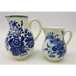  Worcester blue and white sparrow beak jug circa 1770-75, decorated with butterflies amongst flowers, H11cm and another matching smaller jug (2)  