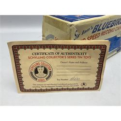 Schylling Collector Series clockwork tin-plate Sir Ian's Bluebird Land Speed Record Car with key and paperwork No.006080; boxed; and clockwork silvered tin-plate model of an 0-6-0 locomotive; unboxed (2)