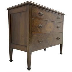 Early to mid-20th century walnut chest, fitted with three graduating drawers with bookmatch veneer facias, raised on square tapering supports