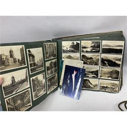 Quantity of post cards in six albums, local interest and photographic postcards, together with an art deco style table lamp