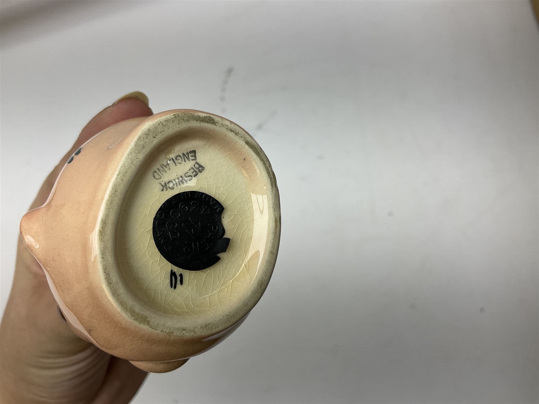 Beswick model of a seated bulldog, model no. 1872, Beswick Laurel & Hardy cruet set on stand, no. 575, Melba Ware animal figures to include large horse, hippo, rhino, USSR tiger cub figure, other ceramics to include Mason's lidded jar etc