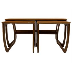 Nathan - teak Long John nest of tables and a singular nest of tables 