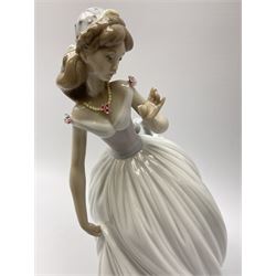 Large Lladro Figures, Spring Splendor, designed by Regino Torrijos, model number 5898, H30.5cm, the glass slipper, designed by Jose Puche, model number 5957, H29cm and Breathless, designed by Juan Ignacio Aliena, model number 6430, H31cm.