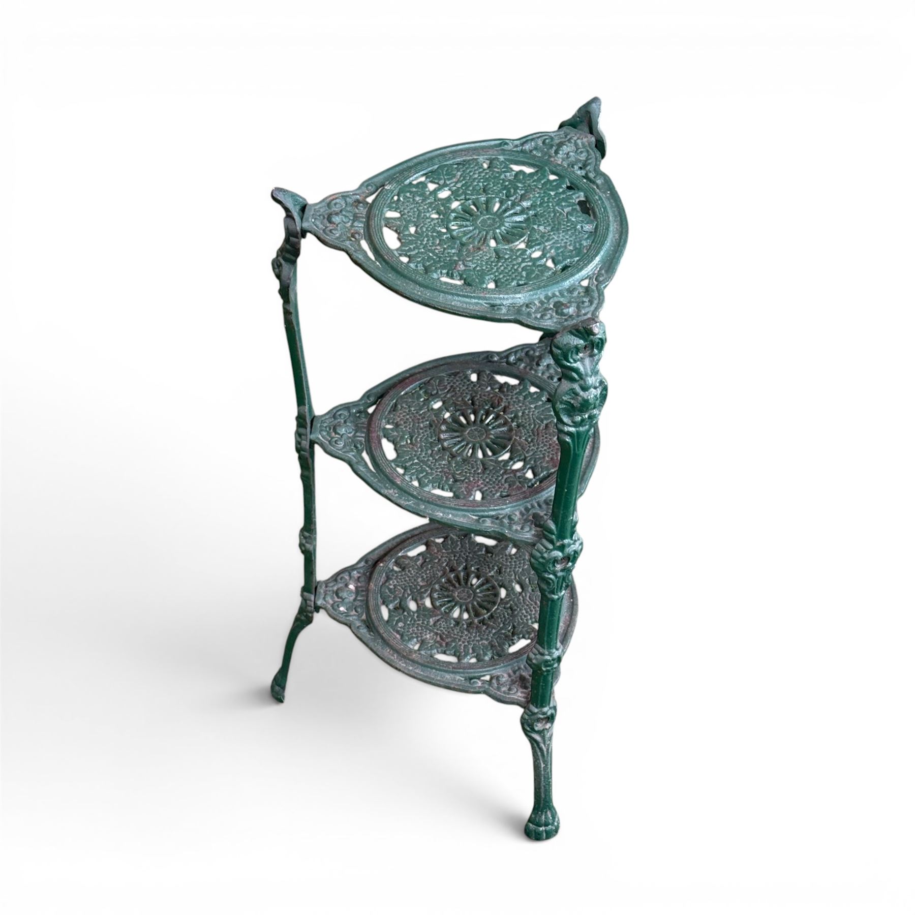 Ornate cast iron three tier garden plant or pan stand, green painted finish