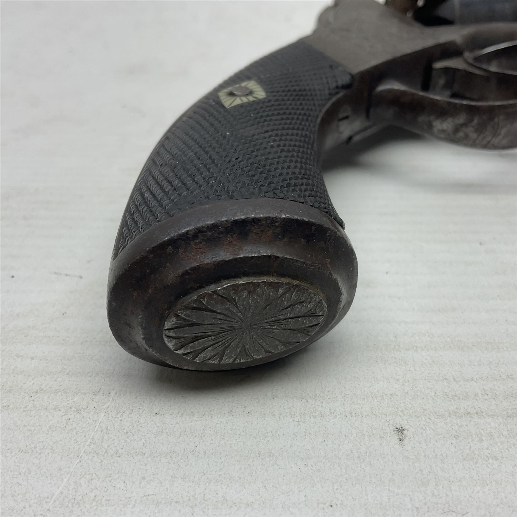 Mid-19th century Smith London .36 cal. transitional five-shot percussion revolver, the 12cm rifled octagonal barrel with side loading lever, side safety, some engraved decoration and chequered two-piece grip L28cm overall