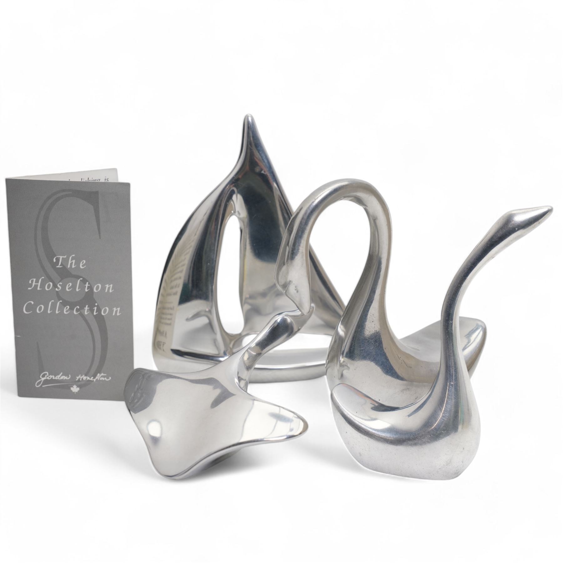 Aluminium Seagull sculpture by Gordon Hoselton (Canadian 1930-2003), mounted on stone base, inscribed no. 622, H33cm; together with four smaller sculptures - Swan no.1361, Sailboat no. 1196,  and Goose no.271, all signed to base (4)
